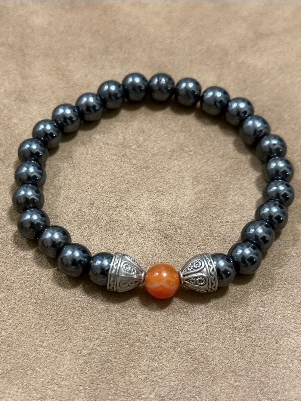 Hematite Beaded Stretch Bracelet with Orange Carnelian Bead